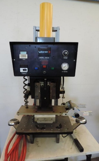 Wagner Model A2000 heat sealer on rolling base.