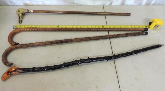 4 vinatage canes.