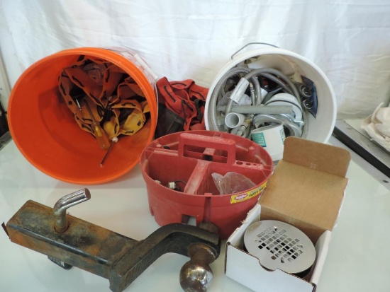 2 buckets of plumbing supplies and 2" drop hitch