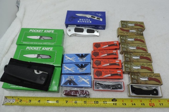 21 Frost Cutlery pocket knives.