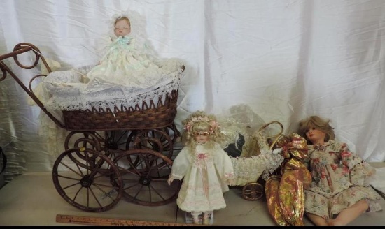 2 decorator doll strollers and 4 dolls.
