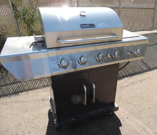 Nexgrill stainless steel gas BBQ with propane tank (Untested).