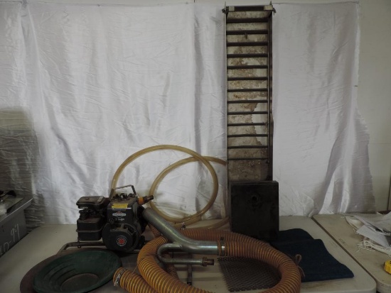 Gold mining gear lot. 3HP pump, 48" sluice box, 2 pans, nozzle and hoses.