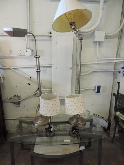 48x26x21" glass top coffee table with 4 stainless steel lamps.