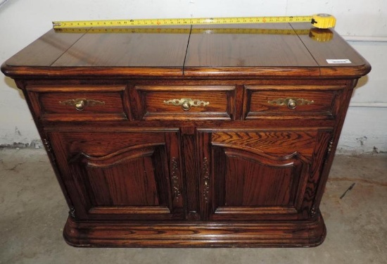 Oak server with fold out bar top.