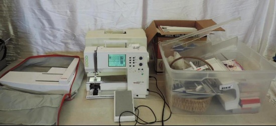 Bernina Artista 180 computerized sewing machine with case and lots of accessories.