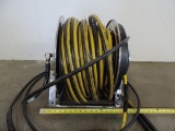Hannay hydrolic commercial hose reel with 100' hose. Model 1011407
