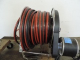 Hannay Hydrolic hose reel with 100' hose. Model 1011407