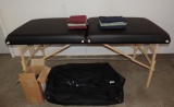 Earth Lite Professional portable massage table in excellent condition with head rest and 6 sets of