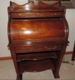 National Mt. Airy small roll top secretary desk with leather writing surface.
