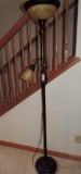 Bronze finish floor lamp with glass shades.