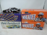 1:24 scale collector cars. 2 1997 wheaties, 1975 charger and 1998 monte Carlo bank.