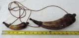 2 horn flintlock powder horns.