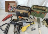 Large assortment of hand tools and tool bags.