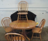 Oak table with 4 chairs.