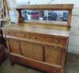 Antique buffet with mirror.