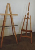2 wooden easle's. 6'x2' and 1 is adjustable.