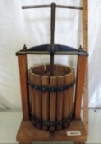 Vintage cast iron and wood press. 12x12x24