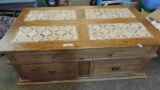 Stone inlayed pine coffee table in d=good condition.