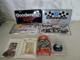 4 NASCAR licence plates, Earnhardt belt buckle, ornaments and card.