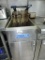 Royal stainless steel commercial deep fryer with 2 baskets.