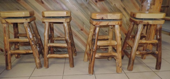 4 Rustic log swivel top bar stools.