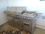 High $ Jenn-Air stainless steel commercial gas grill.