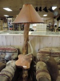 Log and antler lamp with leather shade. 24x20x72