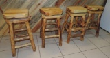 4 rustic aspen log swivel top bar stools.
