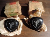 2 late 50's vintage lancia emblems in excellent condition with original boxes.