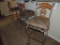 3 cast metal bar stools.