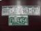 Three sets of Colorado License Plates.