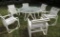 Glass top patio table with 6 chairs.
