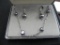 Freshwater pearl and silver earring and pendant set.