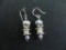 Silver and fresh water pearl dangle earrings.