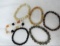 Six assorted stone bracelets.