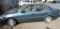 1995 Geo Prizm sedan with 69K miles.