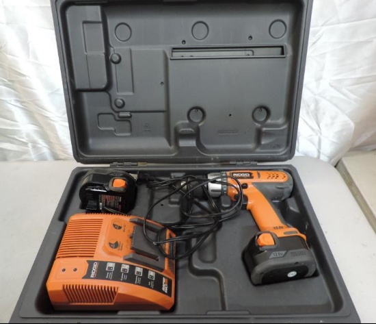 Rigid 12volt drill with charger & case (tested operable).
