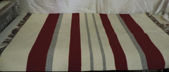 64x34" handmade indian rug.
