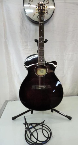 Ibanez AEG20II-TRS-3R-01 acoustic / electric guitar with cord and stand.
