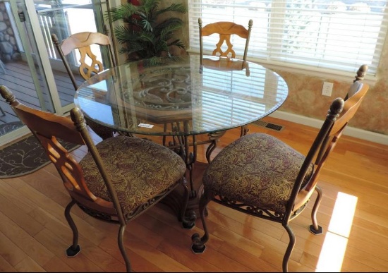 Glass top Table with 4 chairs.