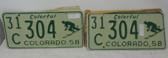 Pair of Pristine NOS condition 1958 skier license plate set.