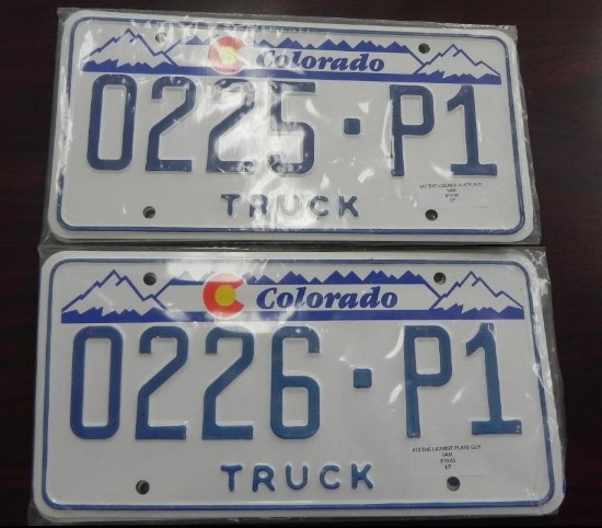 Two pair sequential Colorado Truck License Plates.