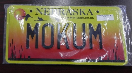 One set Nebraska License Plates.