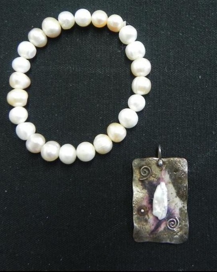 Fresh water pearl bracelet and copper/silver fresh water pendant.