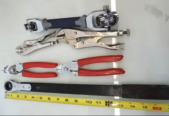 Matco 5/8" ratchet wrench, matco snap ring pliers, 2 pair of vise grips and a Kobalt multi-wrench.