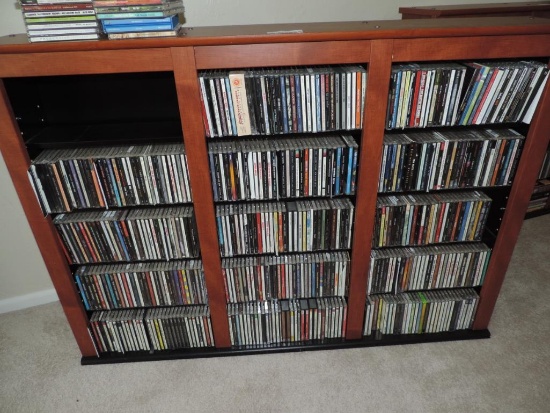 CD rack loaded with hundred's of CD's.