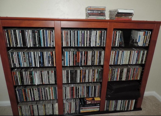 CD rack loaded with hundreds of CD's