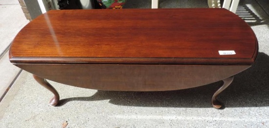 Cherry wood drop side coffee table.