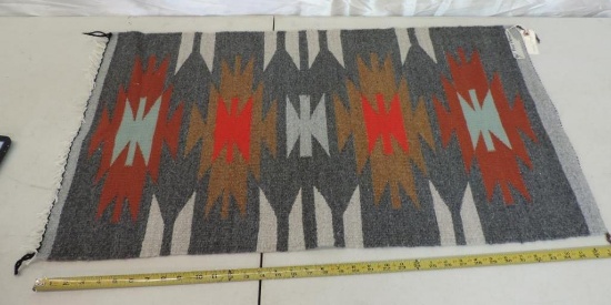 38x20" Navajo rug by Faye peterson in great condition.